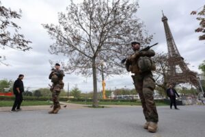 Soldiers patrol along a construction site for the upcoming Olympic Games, at the Trocadero gardens, Thursday, April 11, 2024 in Paris. (AP Photo/Aurelien Morissard)