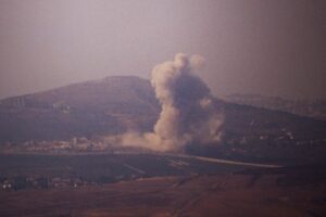 Smoke rises following an explosion in southern Lebanon as seen from northern Israel, Wednesday, Oct. 16, 2024. (AP Photo/Leo Correa)