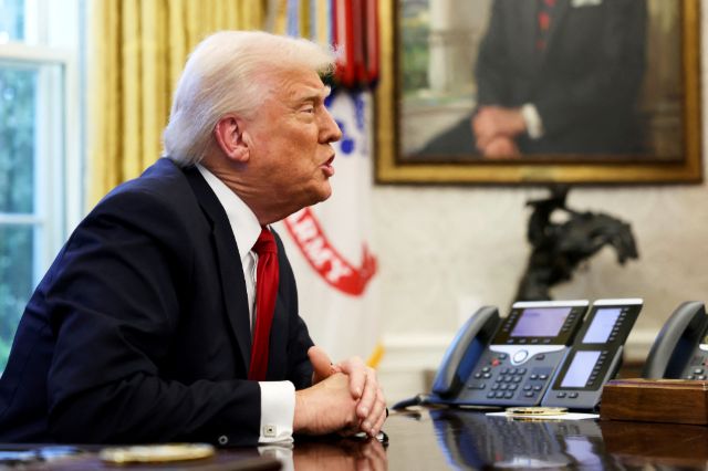 President Donald Trump speaks to reporters in the Oval Office at the White House in Washington, Wednesday, March 26, 2025. (Pool via AP)