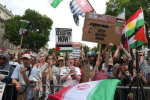 People attend a pro-Palestinians march in central London, Saturday June 21, 2025. (Jeff Moore/PA via AP)
