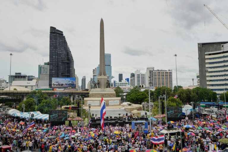 Protesters gather at Victory Monument demanding Thailand's Prime Minister Paetongtarn Shinawatra resign in Bangkok, Thailand, Saturday, June 28, 2025. (AP Photo/Sakchai Lalit)